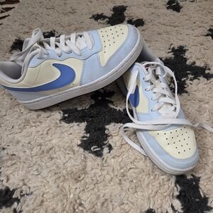 Nike Kids Sneakers in Light Blue, Pale Yellow, and Royal Blue Swoosh